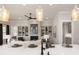 Open-concept kitchen and living space with a fireplace and built-in shelving at 559 Southland Cir, Canton, GA 30115