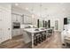 Spacious kitchen with a large island, stainless steel appliances, and stylish pendant lighting at 559 Southland Cir, Canton, GA 30115