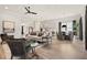 Open-concept living area seamlessly integrates living, dining, and kitchen spaces for modern living at 559 Southland Cir, Canton, GA 30115
