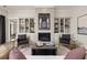 Cozy living room with fireplace and built-in bookshelves, offering a comfortable and inviting space at 559 Southland Cir, Canton, GA 30115