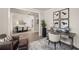 Open-concept home office and dining area with elegant furnishings and decor at 559 Southland Cir, Canton, GA 30115