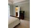 Spacious bedroom with tray ceilings and ensuite bathroom at 611 Parkside Village Nw Way, Marietta, GA 30060