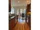 Open concept kitchen boasts stainless appliances, granite countertops, and breakfast seating at 611 Parkside Village Nw Way, Marietta, GA 30060