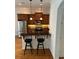 Charming kitchen featuring stainless steel appliances and breakfast bar seating two at 611 Parkside Village Nw Way, Marietta, GA 30060