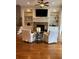 Bright living room with built-in shelving surrounding a fireplace and cozy seating at 611 Parkside Village Nw Way, Marietta, GA 30060
