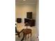 Bright, carpeted living room with modern media center and comfortable seating arrangement at 611 Parkside Village Nw Way, Marietta, GA 30060