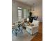 Cozy living room area with comfortable seating, hardwood floors, and natural light at 611 Parkside Village Nw Way, Marietta, GA 30060