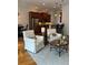 Relaxing seating area near the kitchen with comfortable armchairs and hardwood floors at 611 Parkside Village Nw Way, Marietta, GA 30060
