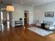 Bright living room featuring hardwood floors, white trim, and decorative furnishings at 611 Parkside Village Nw Way, Marietta, GA 30060