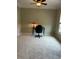 Functional office space, featuring a desk, a chair, a laptop, and a lamp for efficient work at 611 Parkside Village Nw Way, Marietta, GA 30060