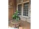 Outdoor patio featuring chairs and a small table with plants at 611 Parkside Village Nw Way, Marietta, GA 30060