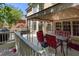 Back deck with seating, a gazebo and an upper level view of backyard at 131 Helmswood Sw Cir, Marietta, GA 30064