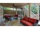 Covered back patio featuring seating, a side table, and stairway at 131 Helmswood Sw Cir, Marietta, GA 30064