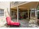 Covered back patio with outdoor seating, ceiling fans and a TV at 131 Helmswood Sw Cir, Marietta, GA 30064
