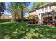 Lush backyard featuring a patio, deck and outdoor seating at 131 Helmswood Sw Cir, Marietta, GA 30064