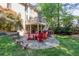 Backyard patio with outdoor seating and a deck overlooking the manicured lawn at 131 Helmswood Sw Cir, Marietta, GA 30064