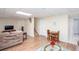 Finished basement featuring wood flooring, a sofa and a small dining set at 131 Helmswood Sw Cir, Marietta, GA 30064
