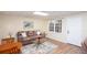Finished basement featuring wood flooring and a comfortable sofa at 131 Helmswood Sw Cir, Marietta, GA 30064