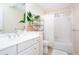 Well-lit bathroom featuring a shower-tub combination and pristine white vanity at 131 Helmswood Sw Cir, Marietta, GA 30064