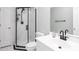 Modern bathroom featuring a sleek glass-enclosed shower and contemporary fixtures at 131 Helmswood Sw Cir, Marietta, GA 30064