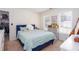 Bright bedroom with big windows, natural light, stylish décor, and a closet with plenty of storage space at 131 Helmswood Sw Cir, Marietta, GA 30064