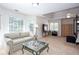 Spacious bedroom with large windows, vaulted ceilings, and comfortable seating area at 131 Helmswood Sw Cir, Marietta, GA 30064