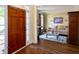Spacious foyer flows into a cozy living room with decorative rug and furniture, filled with natural light at 131 Helmswood Sw Cir, Marietta, GA 30064