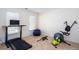 A home gym with treadmill, stationary bike, exercise ball, and standing desk at 131 Helmswood Sw Cir, Marietta, GA 30064