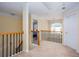 Upstairs hallway featuring a view of the outdoor scenery from the window at 131 Helmswood Sw Cir, Marietta, GA 30064