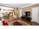 Open floor plan connects the living room to kitchen and dining area with staircase nearby at 131 Helmswood Sw Cir, Marietta, GA 30064