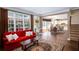 The open-concept living room is adjacent to the kitchen with a smooth transition to the outdoor patio at 131 Helmswood Sw Cir, Marietta, GA 30064