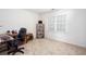 Bright home office featuring a window and neutral color palette at 131 Helmswood Sw Cir, Marietta, GA 30064