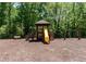 Community playground with swings, slide, and a bench providing hours of outdoor fun at 131 Helmswood Sw Cir, Marietta, GA 30064