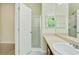 This bathroom features a shower, vanity, and sink, offering both style and functionality at 168 Ellis Dr, Conyers, GA 30012