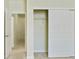 Bedroom features neutral walls, carpet, and doors at 168 Ellis Dr, Conyers, GA 30012