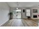 Bright dining area with sliding glass doors to the backyard and hardwood flooring at 1965 Winnstead Pl, Loganville, GA 30052