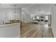 Open floor plan showcasing the living and dining areas, with natural light and hardwood flooring at 1965 Winnstead Pl, Loganville, GA 30052