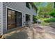 Back patio with a fire pit, grill, and sliding glass doors to the home's interior at 890 Muirfield Rdg, Marietta, GA 30068