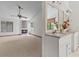 Bathroom featuring dual granite countertop vanities and a fireplace at 890 Muirfield Rdg, Marietta, GA 30068