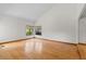 Spacious room with vaulted ceilings and hardwood floors, providing ample natural light at 890 Muirfield Rdg, Marietta, GA 30068