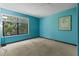 Bedroom featuring ample light, cozy carpeting, and relaxing ambiance at 890 Muirfield Rdg, Marietta, GA 30068