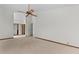 Spacious main bedroom with plush carpet and ceiling fan at 890 Muirfield Rdg, Marietta, GA 30068