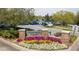 Indian Hills Country Club entrance with a landscaped sign and a full parking lot at 890 Muirfield Rdg, Marietta, GA 30068