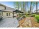 Backyard features a charming gazebo and stone pathway through the landscaped yard at 989 Vendue Dr, Lawrenceville, GA 30044
