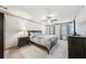 Spacious main bedroom with king bed, ceiling fan, and neutral decor at 989 Vendue Dr, Lawrenceville, GA 30044