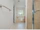 Well-lit bathroom with glass shower, soaking tub, and tiled floors at 2430 Dresden Parc Cir, Atlanta, GA 30345