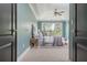 Bedroom boasts high tray ceiling, large windows, and ensuite bathroom at 2430 Dresden Parc Cir, Atlanta, GA 30345