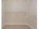 Walk-in closet space featuring neutral carpet and wire shelving at 2430 Dresden Parc Cir, Atlanta, GA 30345
