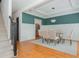 Open dining area with decorative molding, coffered ceiling, and hardwood flooring at 2430 Dresden Parc Cir, Atlanta, GA 30345