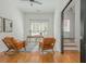 Bright home office with hardwood floors, modern decor, and ample natural light from a window at 2430 Dresden Parc Cir, Atlanta, GA 30345